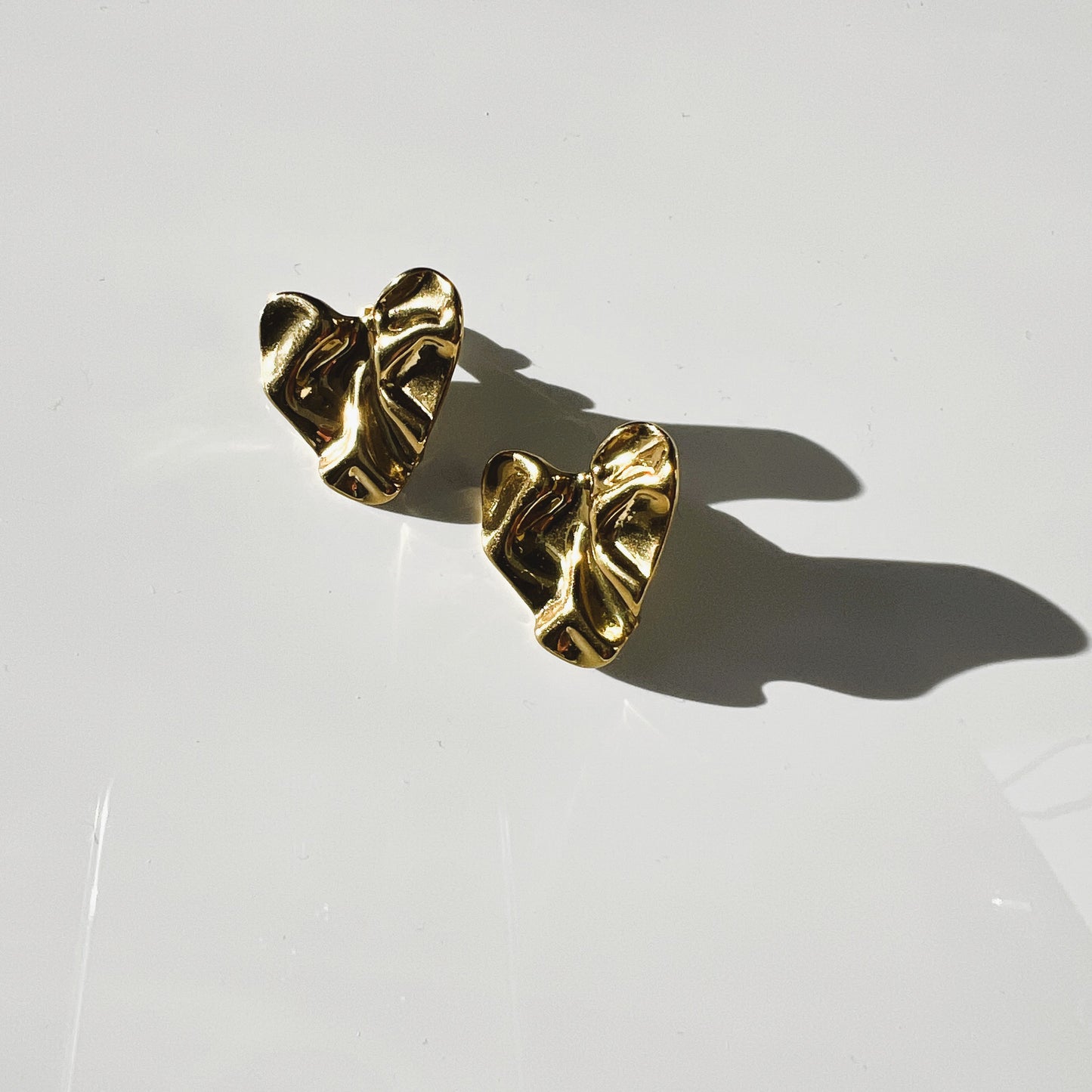 Gaia heart earring